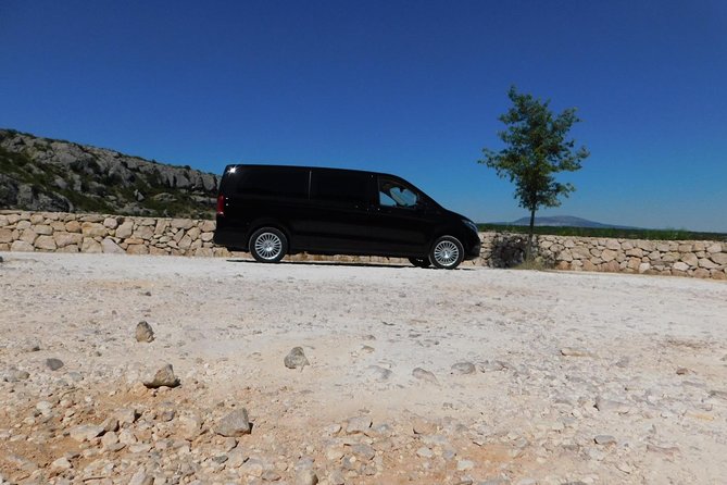All inclusive luxury Krka waterfalls trip from Split or Trogir. - Bibich Winery tasting: included wine, with a paid lunch option