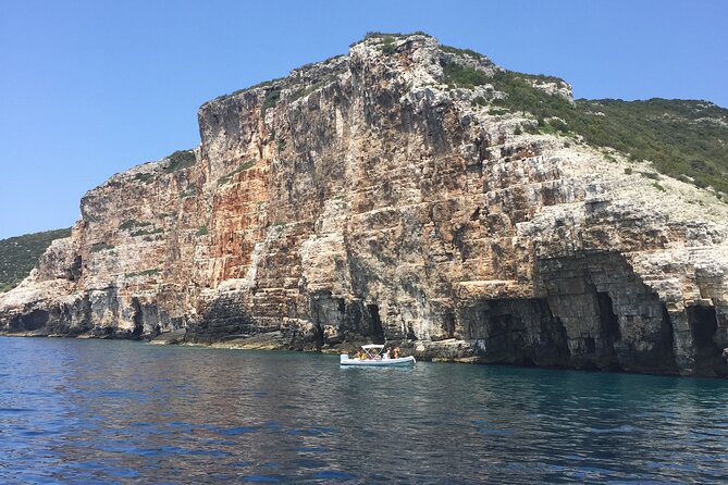 Blue Cave and Town Hvar with 5 Island Boat Tour - Komiža: a working fishermen’s town with cliffs, harbors, and narrow streets