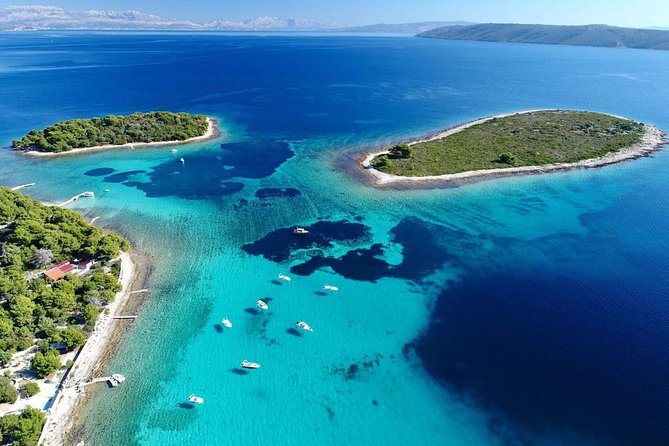 Blue Lagoon, Trogir & Čiovo catamaran tour with Food and Drinks - Trogir on foot: UNESCO streets plus 90 minutes of freedom