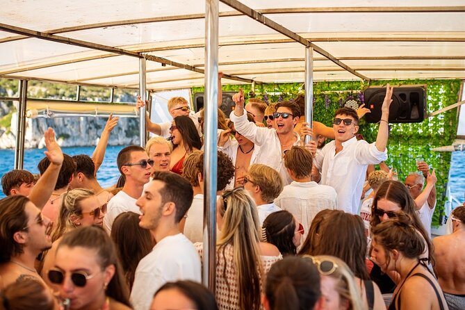 Captain’s Boat Party Split–Blue Lagoon Swim Stop + Free Shots &DJ - Free Shots, Welcome Drink, and the Nightclub Add-On