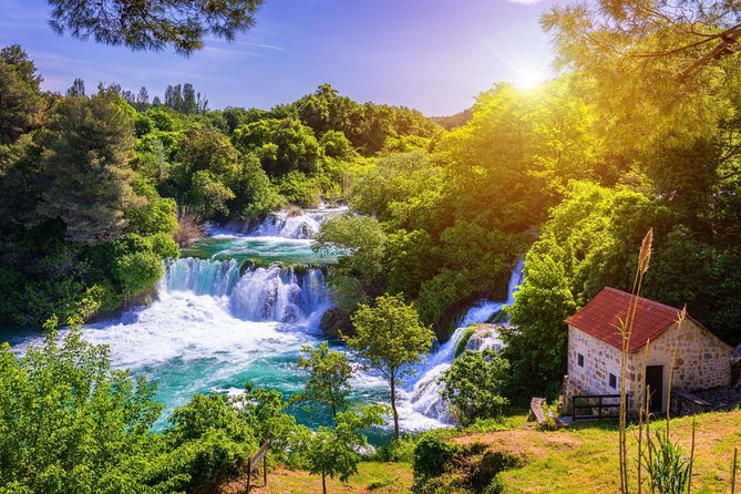 Krka Waterfalls & historic Šibenik - driver&guide, boat cruise, lunch break - Krka National Park: Green Walking, Waterfalls, and Old Mills