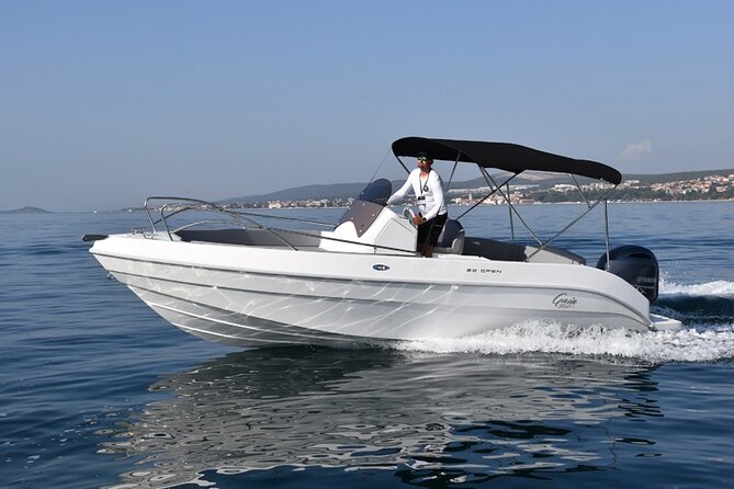 Magic Private Boat Tour from Split - Stop 2: Blue Lagoon / Krknjasi Bay for snorkels, swims, and dolphin chances