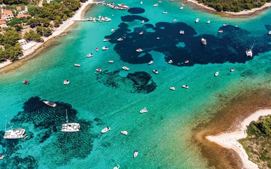 Split: Blue Lagoon and 3 Island Cruise with Food and Drinks - Onboard Starts Strong: Breakfast Donuts, WiFi, and Drinks on Tap