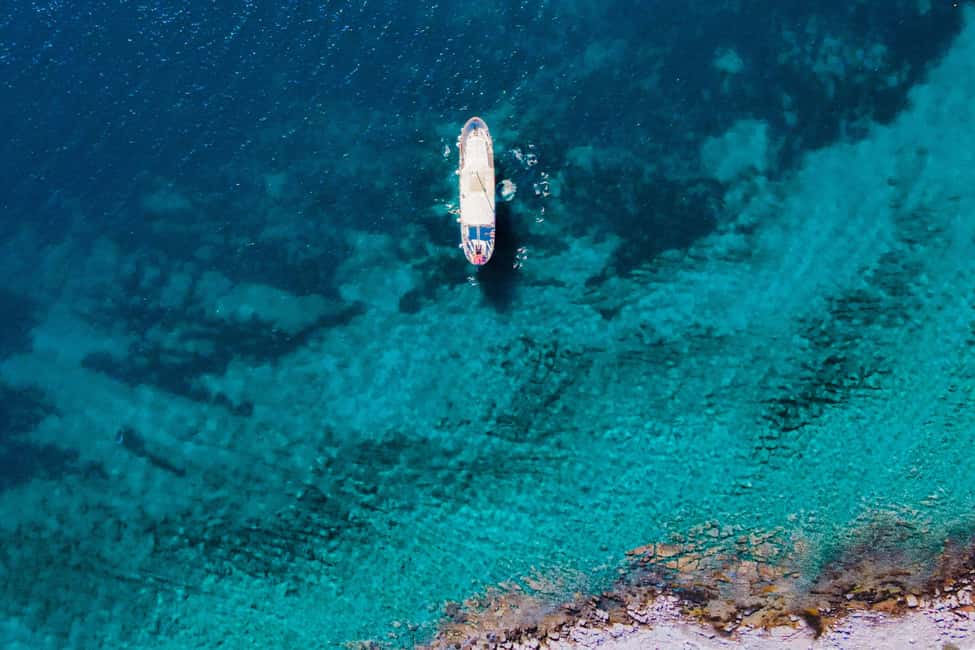 Split: Blue Lagoon Boat Party with Slide, Dj and After Party - Hidden bay swim stop: quick, refreshing, and all about jumping in