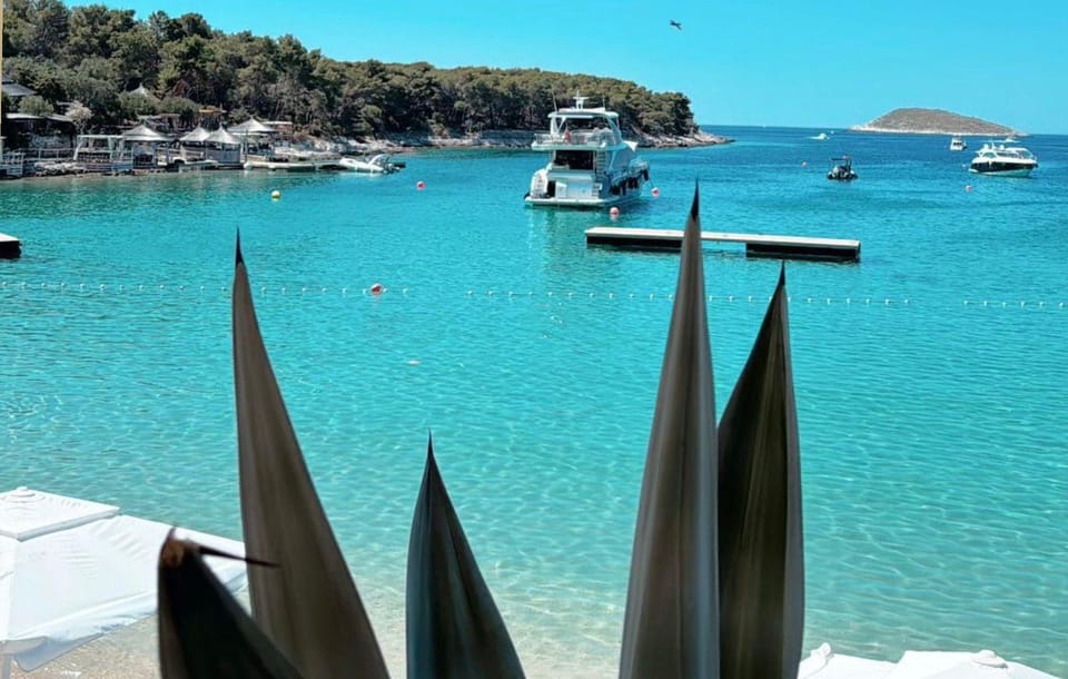Split: Blue Lagoon, Hvar and 5 Islands Small Group Boat Tour - Milna on Brač: first harbor photos and a gentler start